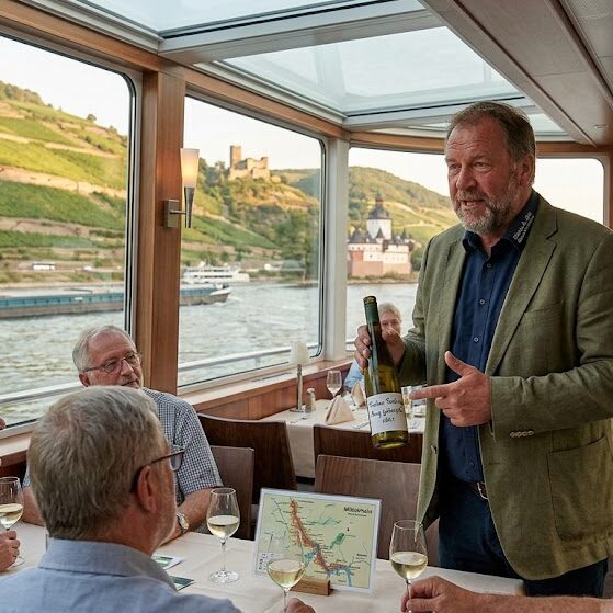 vineyard owner talking about their wine on cruise